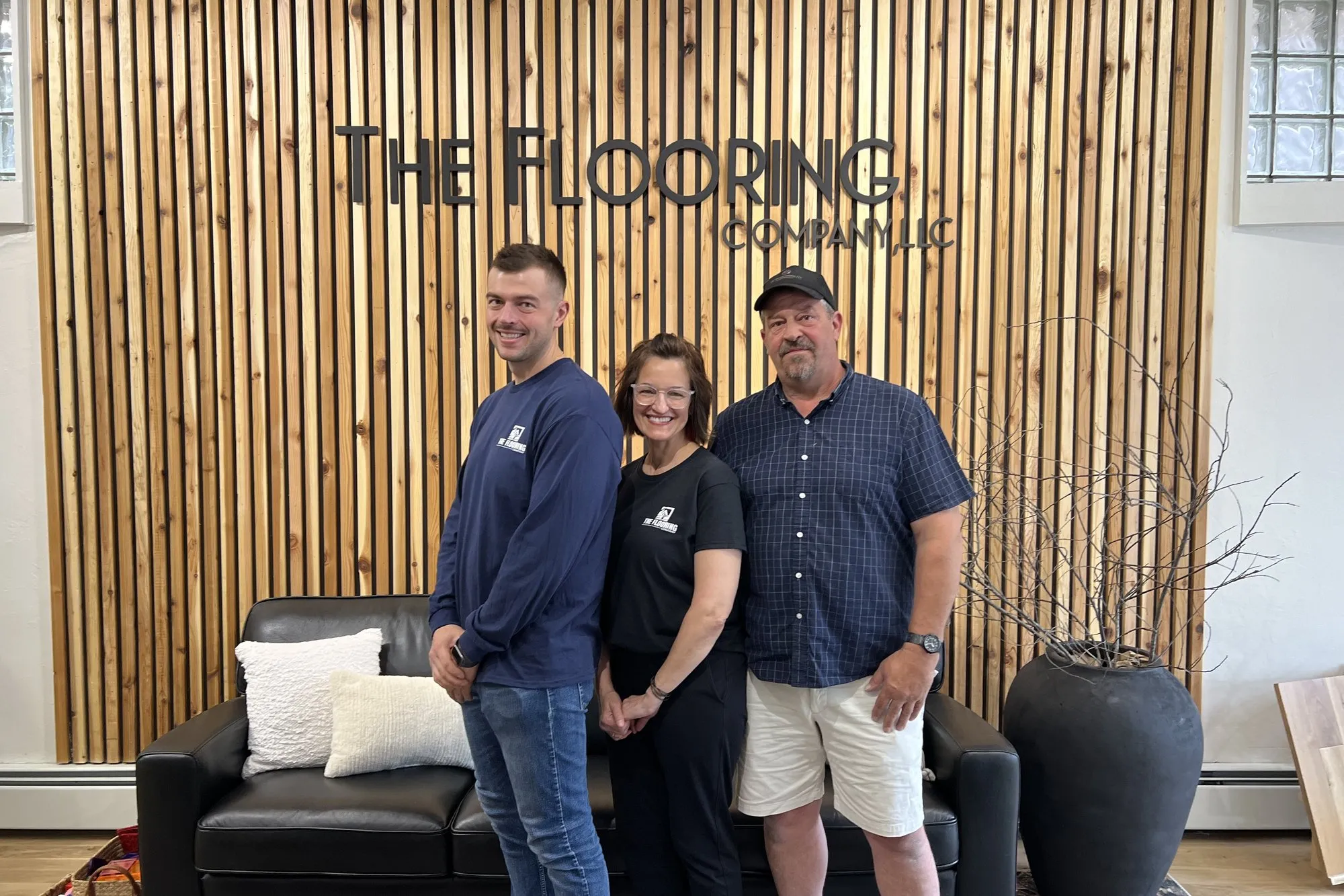 Drew, Annette, and Bob of The Flooring Company in their downtown Oconomowoc showroom